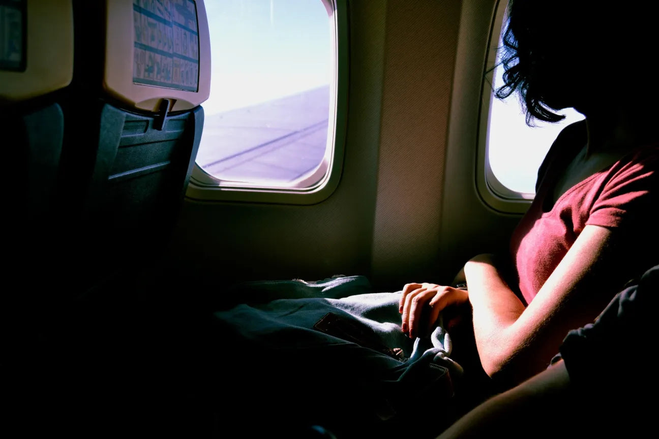 How to Sleep on a Plane: Tips and Tricks
